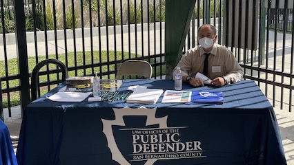 Deputy Public Defender Allen Phou at the San Bernardino County Public Defender table, Fontana CAP Fair 2021